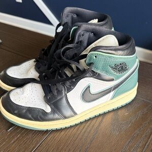 Air Jordan Black and White High-Top Sneakers